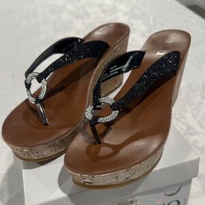XOXO Glitter Black and Tan Wedge Sandals